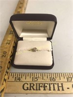 10K gold ring, size 3.75. Weight: 1.6 grams.