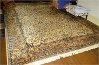 Wool area rug. Dimensions: 165" x 119"