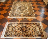2 hooked rugs. Dimensions of largest: 95" x 60"