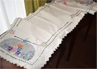 Vintage embroidered table runner. Dimensions: 76"