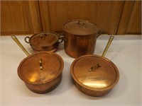Four Copper Coated Pans