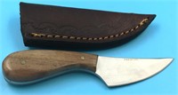 Small patch knife with wood scales and leather she