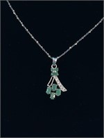 Sterling silver necklace with emerald and CZ