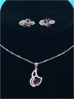 Sterling silver necklace with garnet and CZ and a