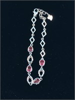 Sterling silver bracelet with garnets and CZs