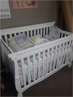 Crib with blankets and sheets