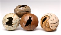 A COLLECTION OF CARVED BONE AND STONE SMUDGE POTS