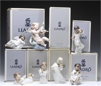 A COLLECTION OF SEVEN LLADRO ANGEL FIGURES W BOXES
