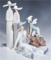 A COLLECTION OF LLADRO NUN AND HARLEQUIN FIGURES