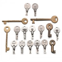 A GROUP OF RAILROAD DOOR AND LOCK KEYS