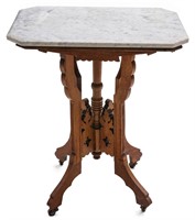 A 19TH CENTURY VICTORIAN WALNUT PARLOR TABLE