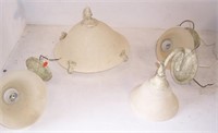(3) Wall sconces and (1) ceiling light.
