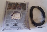 Bag of erosion patch and coil of two strand wire.