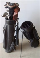 (3) Golf bags (1) set of clubs and a hand cart.