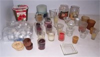 Various candles and candle holders.