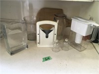 bagel slicer, water purifier, jars, votive cups
