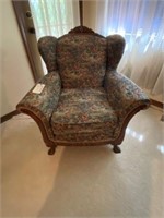 Wood carved wing back chair