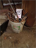 Bucket of trap stakes