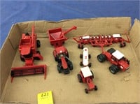 7 assorted 1/64 scale farm toys