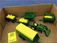 6 assorted John Deere 1/64 scale farm toys