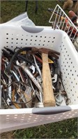 Basket of tools hammer pliers wrenches