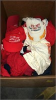 Box of trump baseball caps and T-shirts