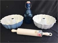 Milk bottle and bunt pans and roller