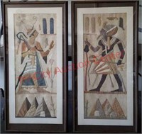 Pair of framed Egyptian fabric panels. Artist