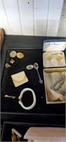 Bracelet, earrings and pins