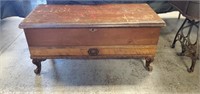 Cedar chest with wooden legs spray paint on top