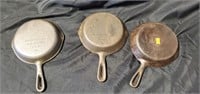 Three 61/2 inch made in Taiwan caat iron skillets