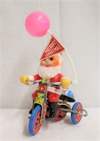 Vintage tin Santa on wheels Made in Korea