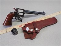 H&R model 976 22LR revolver handgun with leather
