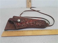 Leather tooled holster with leg strap