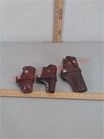 3- leather pistol holsters