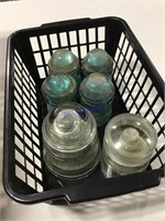 6 glass insulators  in basket