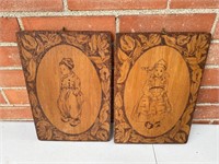 Carved and fired wood Dutch boy and girl