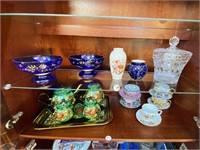 5 pcs of glassware on shelf