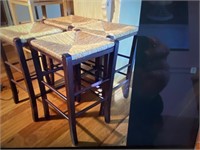 4 stools with wicker tops