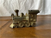 Antique train piggy bank & Whale paperweight