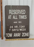 Reserve parking tow away zone sign