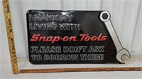 Embossed snap-on tools figural sign