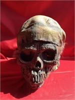 A PIRATE SKULL HALLOWEEN MASK THAT HAS BEEN P