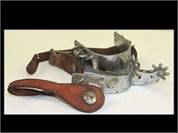 GOOD PAIR OF USER SPURS W/ LEATHER STRAPS