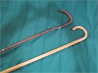 2 wooden canes
