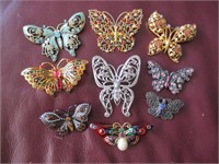 9 butterfly brooches