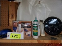 CONTENTS OF SHELF- CLOCK, GLUE, EAR PROTECTION
