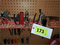 LOT PLIERS- SCREWDRIVERS IN HOLDER ON WALL