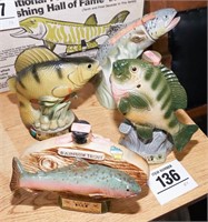 Jim Beam sealed fish decanters (4) w/ official...