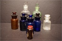Apothecary bottles with stoppers